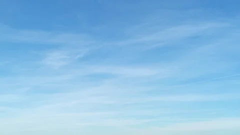 Blue sky with light soft cirrus clouds, time lapse. Natural background for Stock Footage 337886304