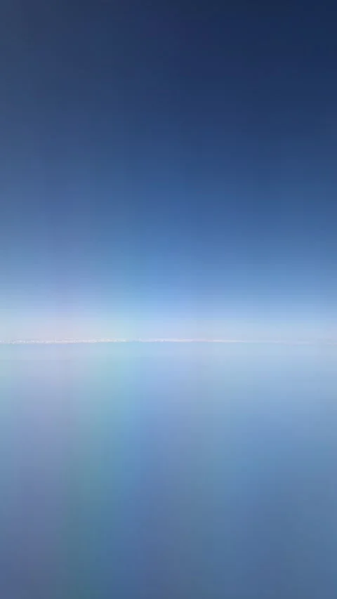 Blue sky with a light stripe in the middle, vertically Stock Footage 241338249