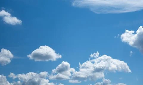Blue sky with light white clouds Stock Photos