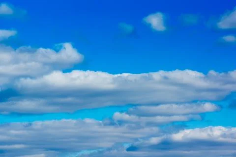 Blue sky with light white clouds Stock Photos