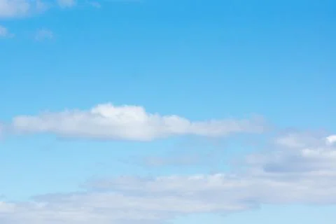 Blue sky with light white clouds Stock Photos