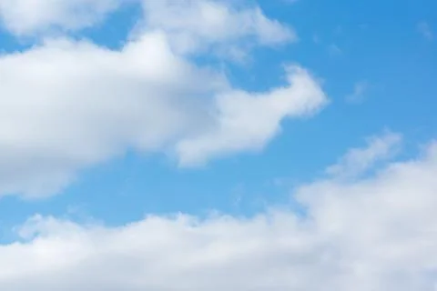 Blue sky with light white clouds Stock Photos
