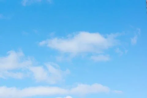 Blue sky with light white clouds Stock Photos