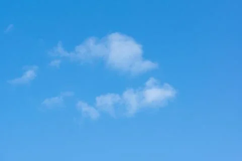 Blue sky with light white clouds Stock Photos