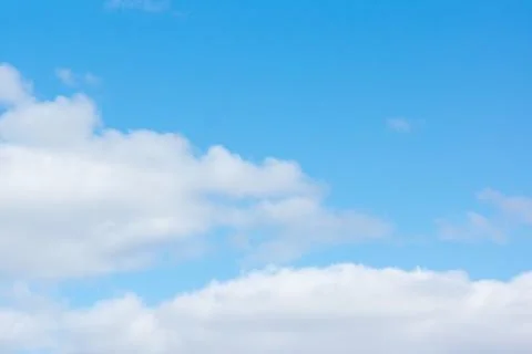 Blue sky with light white clouds Stock Photos