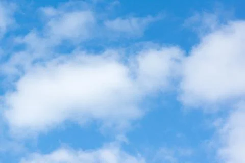 Blue sky with light white clouds Stock Photos