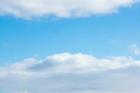 Blue sky with light white clouds Stock Photos