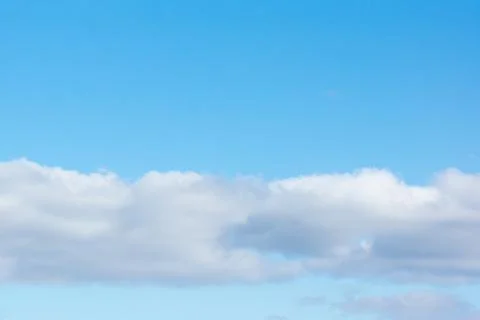 Blue sky with light white clouds Stock Photos