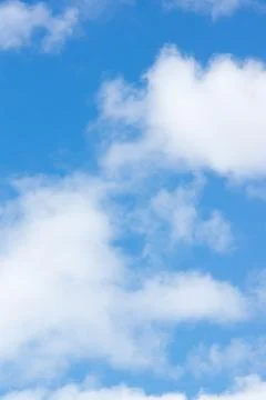 Blue sky with light white clouds Stock Photos
