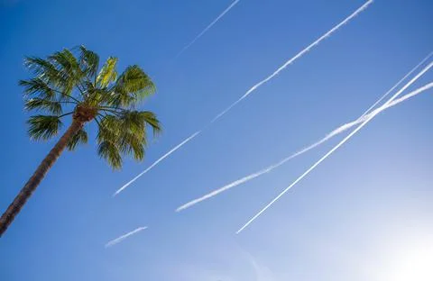 Blue sky with many clouds lines made of aircraft Stock Photos