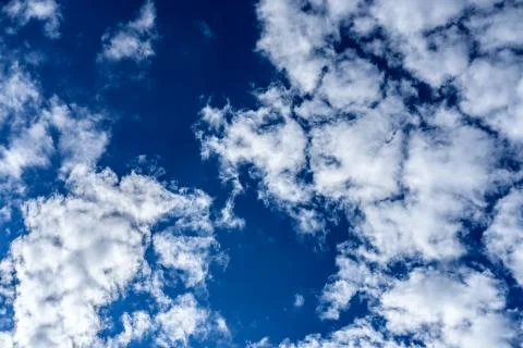 Blue sky with many small clouds. Stock Photos