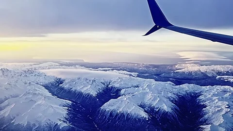 A blue sky with mountains in the background Stock Footage 276309911