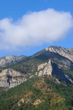 Blue sky, mountains Stock Photos