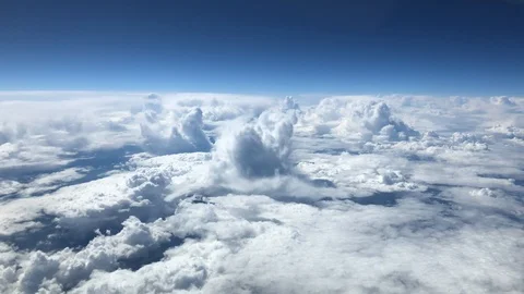 Blue sky moving high above the earth at airplanes flights height Stock Footage 106574916