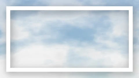 Blue Sky with Moving White Clouds and Rectangular Frame Overlay Stock Footage 335197125