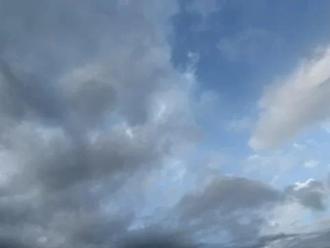 Blue Sky Opening Through Dramatic Storm Clouds Stock-Fotos
