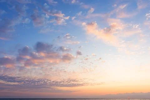 Blue sky with orange clouds Stock Photos