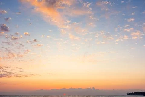 Blue sky with orange clouds Stock Photos