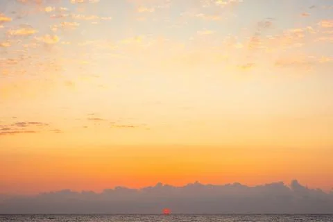 Blue sky with orange clouds Stock Photos