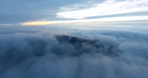 Blue sky over the clouds with the wintery view on a hilltop Stock Footage 89651801