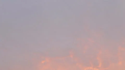Blue sky over which pink clouds float Stock Footage 124845730
