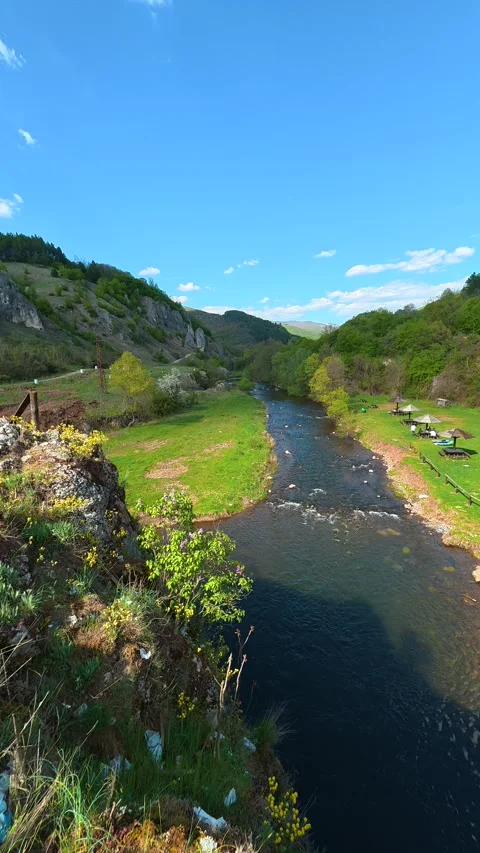 Blue sky overlooks winding river valley. Temska River, Serbia. Vertical 스톡 동영상 333700938