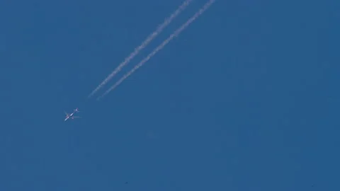 Blue sky, the plane is flying Video stock 157706392