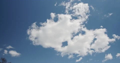 Blue sky, puffy white clouds, time lapse, cumulus clouds Stock Footage 139058364