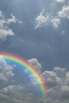 Blue sky with rainbow Foto stock