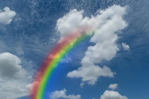 Blue sky with rainbow Foto stock