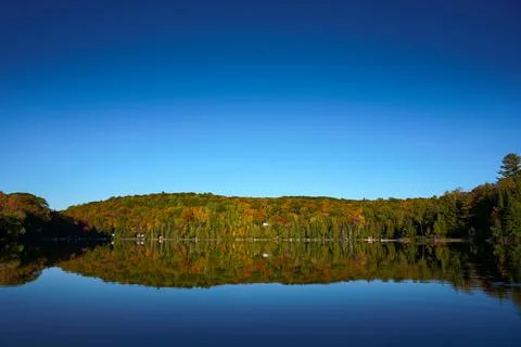 Blue sky reflected in lake Stock Photos
