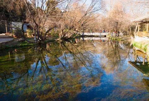 Blue sky reflection in a lake Stock Photos