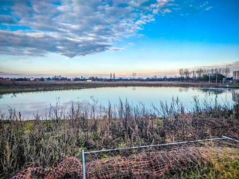 Blue sky reflection on lake Stock Photos