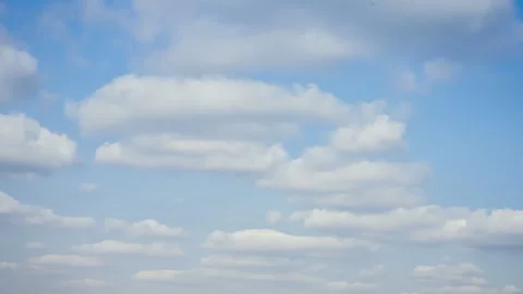 Blue Sky With Rolling Clouds 4K Timelapse Stock Footage 320920475