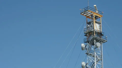 The blue sky with the satellite tower in Narva Estonia 스톡 동영상 224422244