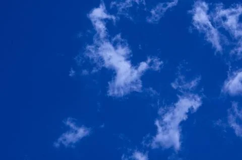 Blue sky saturated with clouds Stock Photos