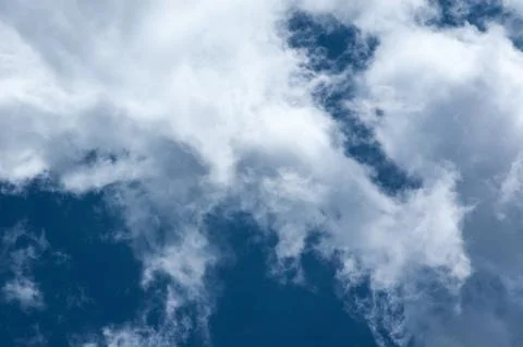 Blue sky saturated with clouds Stock Photos