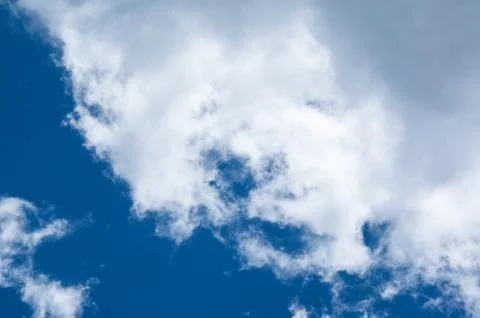 Blue sky saturated with clouds Stock Photos