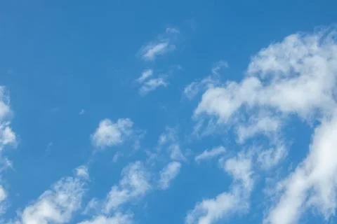 Blue Sky with Scattered Clouds Stock Photos