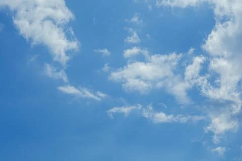 Blue Sky With Scattered Clouds Stock Photos
