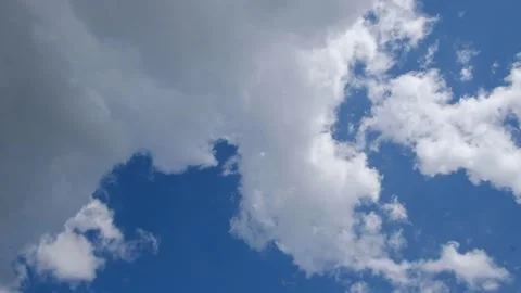 Blue sky with scattered white clouds, a clean natural background for weather Video stock 341473036