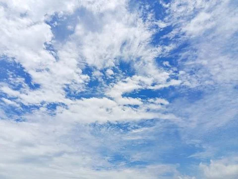 Blue Sky with Scattered White Clouds Stock Photos