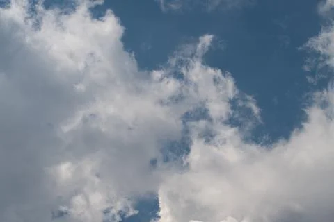 Blue sky with scattered white clouds Foto stock