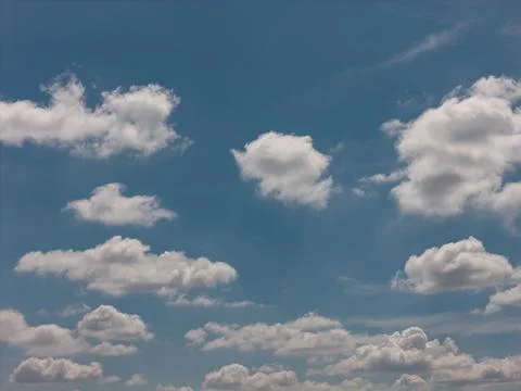 Blue sky with scattered white clouds during daytime 스톡 사진