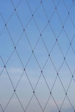 Blue Sky Seen Through Window Safety Mesh Stock Photos