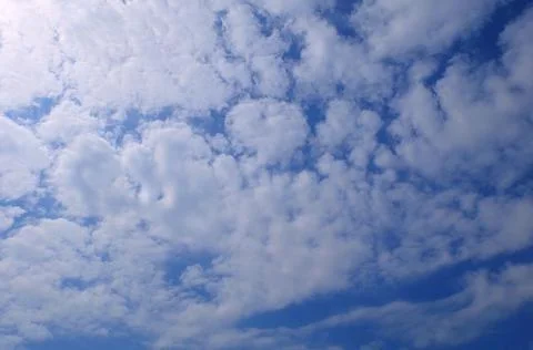 Blue Sky with Small White Clouds Stock Photos