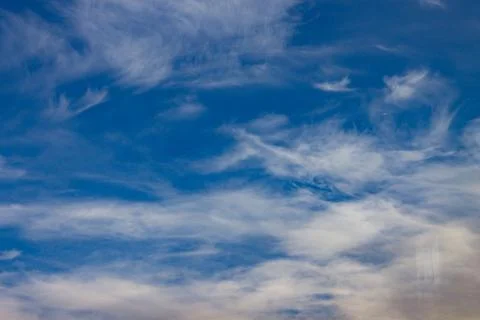 Blue sky with soft clouds in the winter Stock Photos