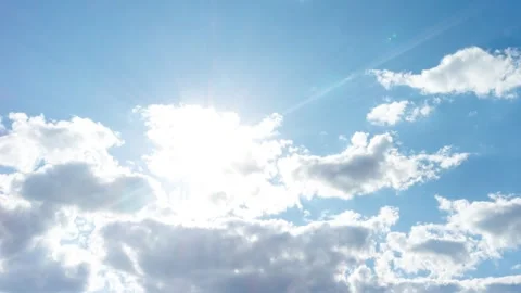 Blue sky with soft white clouds and sun. abstract timelapse, Sky with clouds. Stock Footage 315088449