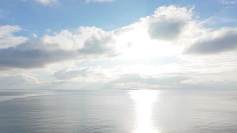 Blue sky with soft white clouds drifting in peaceful daylight Stock Footage 327840181