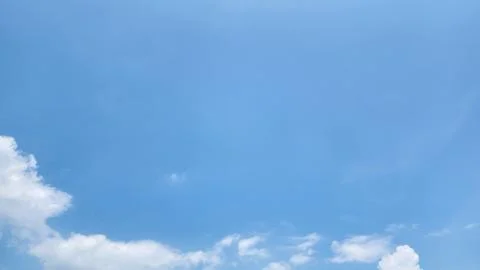 Blue sky with soft white clouds Foto stock